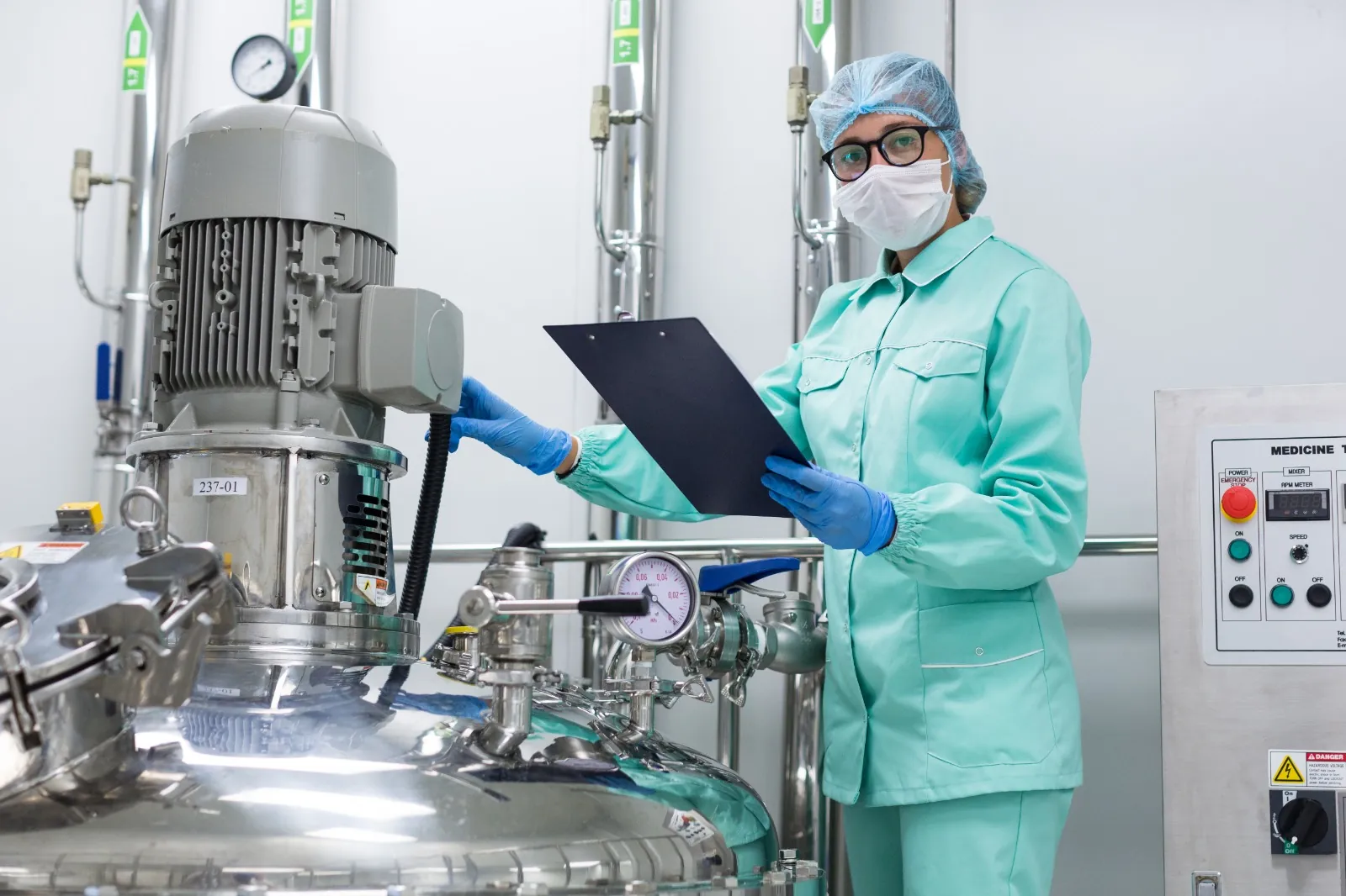 Staff managing inventory and quality inspection at Alira Pharmaceuticals manufacturing unit